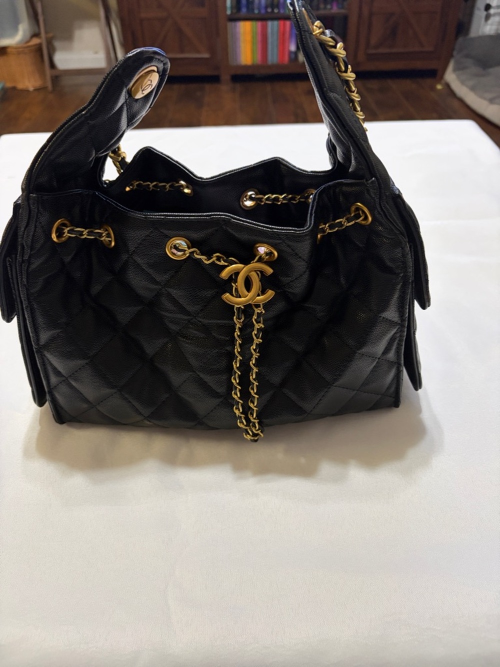 Black Quilted Shoulder Bag with Gold Chain and Logo Accent